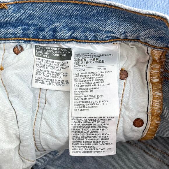 Levi's High Rise Ripped Blue Jeans - Picture 12 of 15